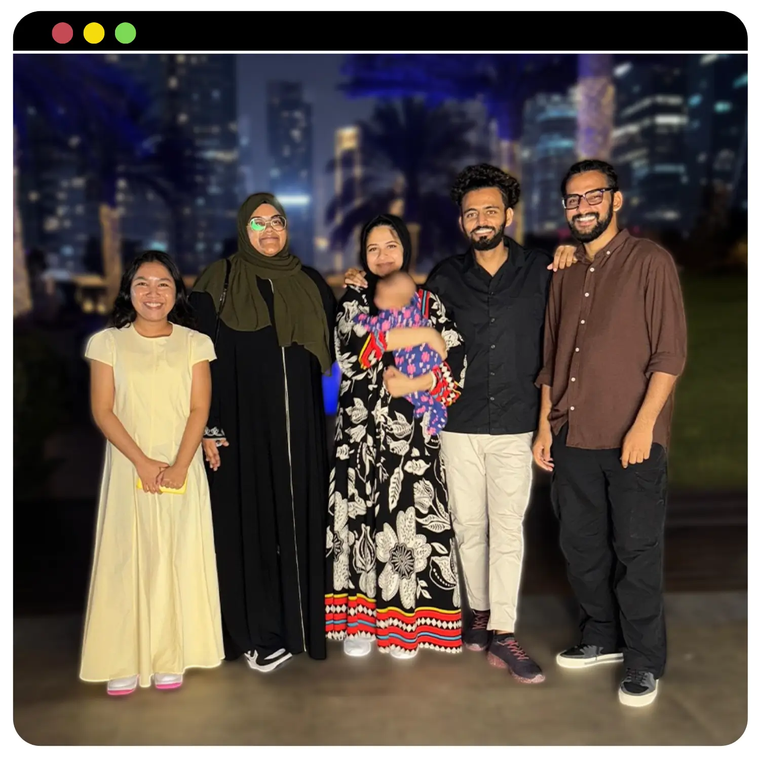 The Donut Media team standing together at night in Dubai