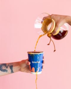 social media post of coffee pouring into a up and spilling