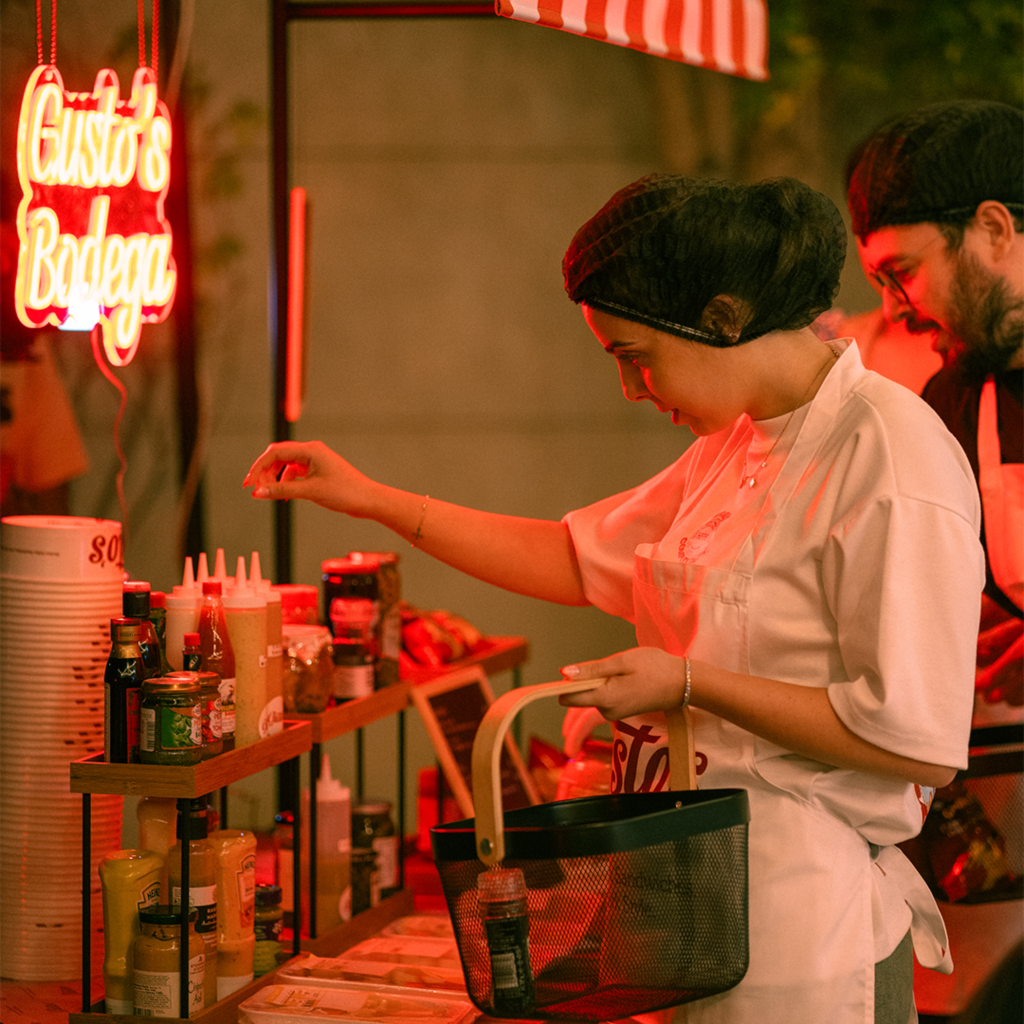 thedubailist influencer selecting food items for the cloud kitchen launch as part of the cloud kitchen marketing strategy