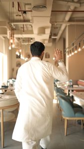 Restaurant repositioning through authentic storytelling: Chef preparing traditional Pakistani cuisine at Nayaab Haandi Dubai.