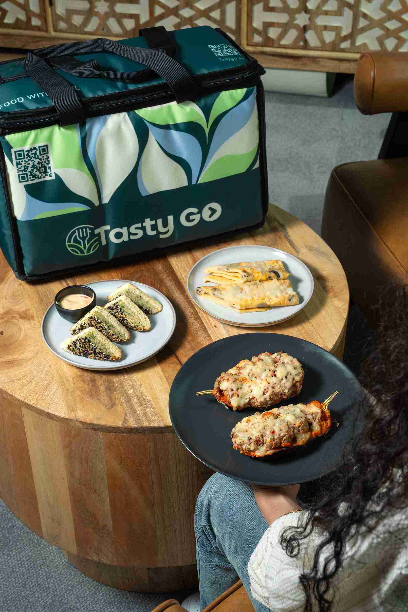 TastyGO meal-plan dishes plated on a table