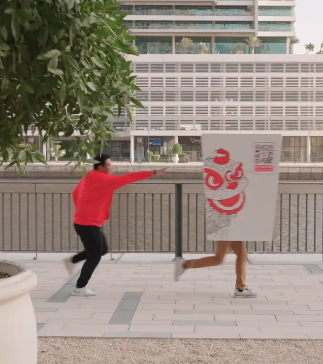 Asian Wok Wok Box Man skit: the wok box man running across Dubai